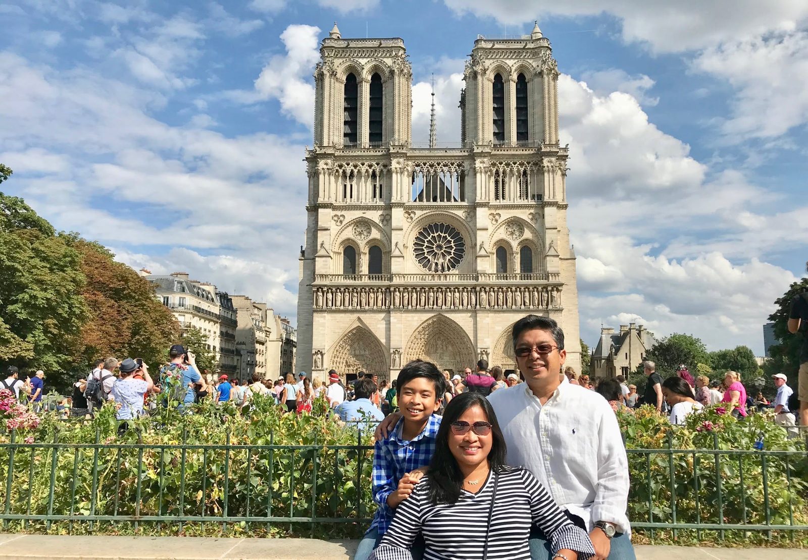 Renato Cruz Sogueco and family in front of Notre-Dame de Paris