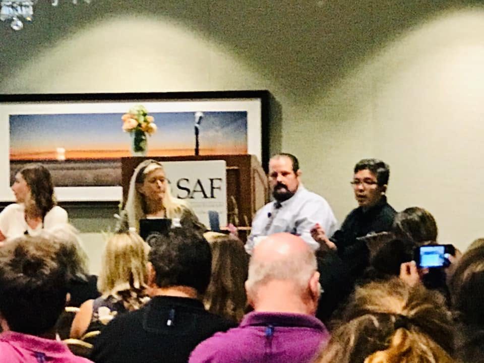 Renato Cruz Sogueco speaking on a panel at an SAF event